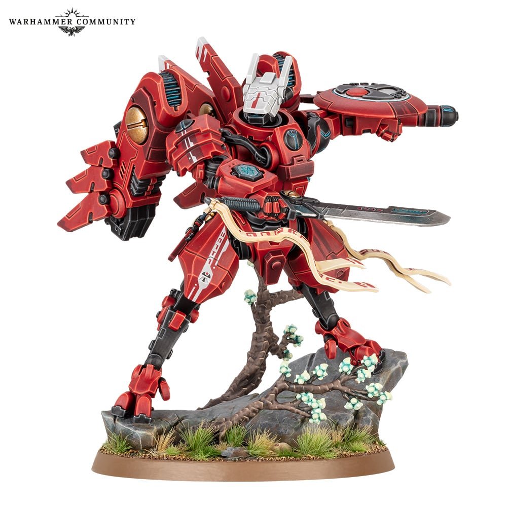 Commander Farsight's XV-86 Supernova battlesuit miniature holding the Dawn Blade