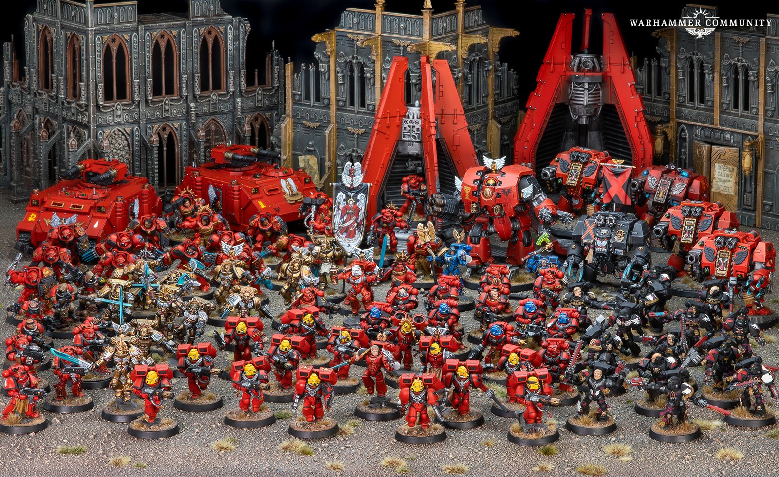 A red-armoured Blood Angels army arrayed for battle around a flying figure of the Sanguinor
