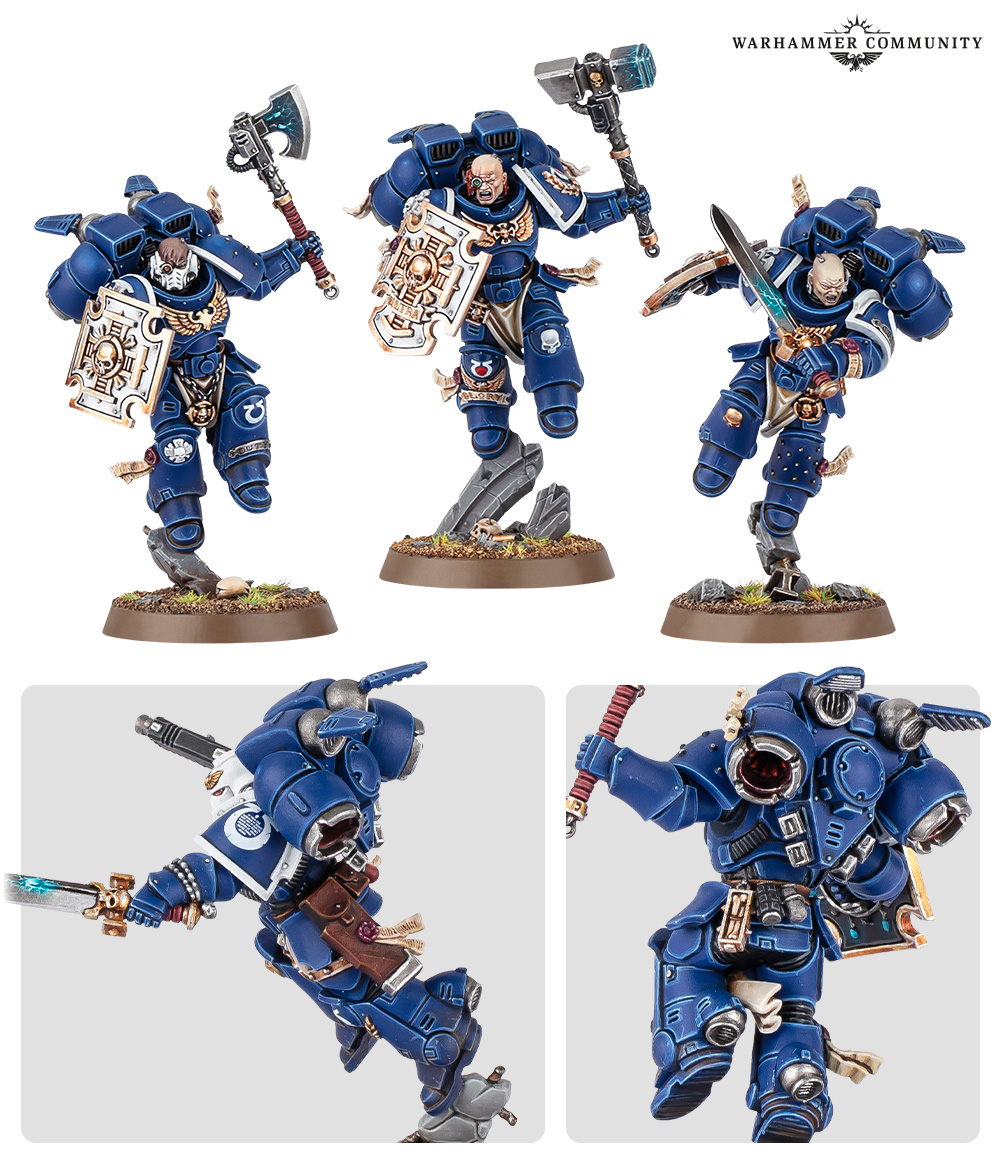 Three Vanguard Veterans with combat shields, thunder hammer, and power axe
