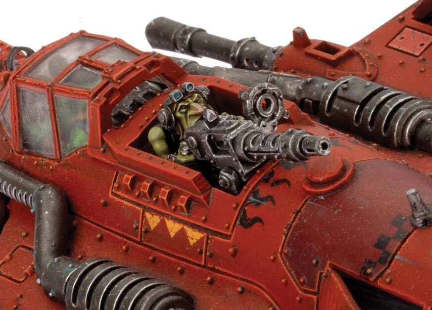 Close-up of the red plastic Ork bommer kit showing the Gretchin gunner manning a rear-facing gun