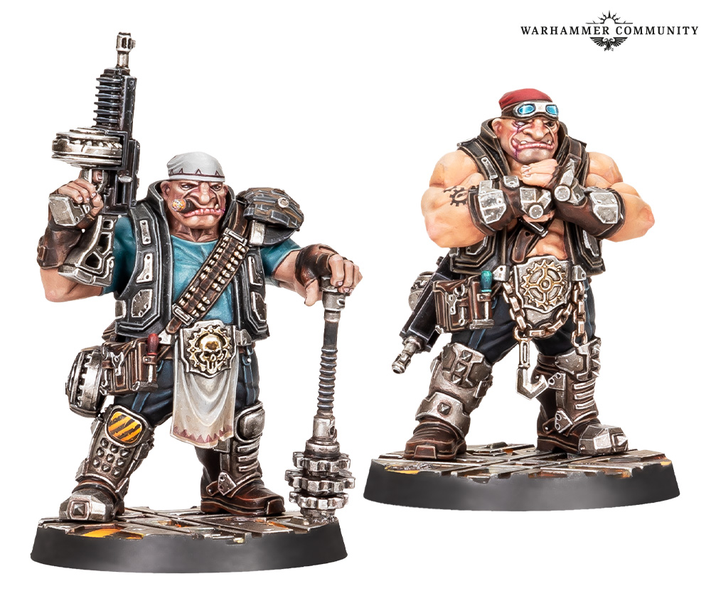 Two Orlock Ogryn Minders, one holding a drum-fed ripper gun and a gear-headed maul, the other with arms folded and goggles on its forehead