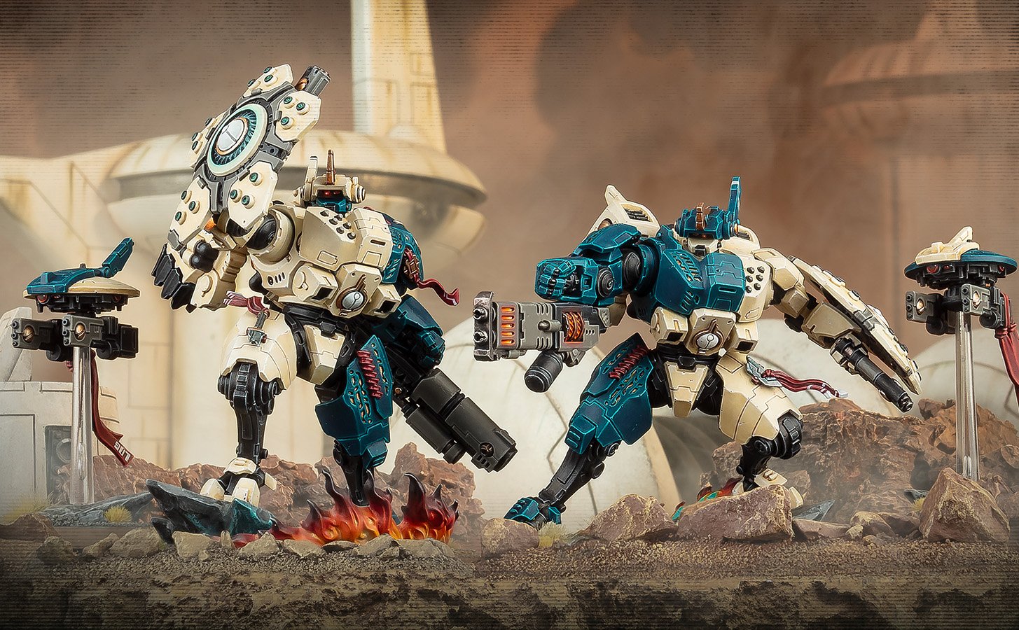 T'au battlesuits advancing across broken ground