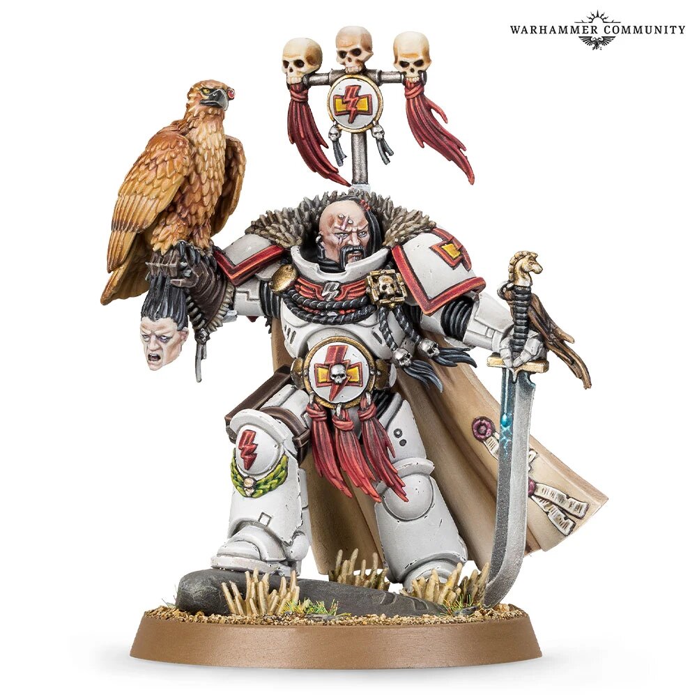 The Primaris Kor'sarro Khan miniature in white and red White Scars armour, standing on foot with a psyber-eagle perched on his outstretched arm and a severed head at his belt