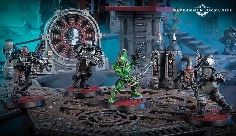 A Space Marine Scout squad advancing across industrial terrain, one kneeling with a sniper rifle, an Aeldari warrior ahead of them
